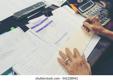 Business Concept , Businesswoman Writing Check ( Text Saying List Of Products And Total Amount )