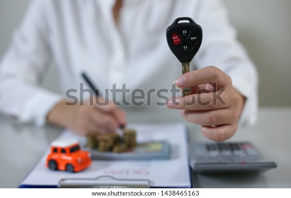Business concept, car
insurance, sell and buy car, car financing, car key for Vehicle
Sales Agreement.