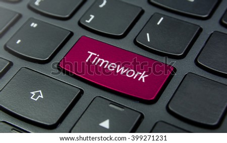 Business Concept: Close-up the Timework button on the keyboard and have Magenta color button isolate black keyboard