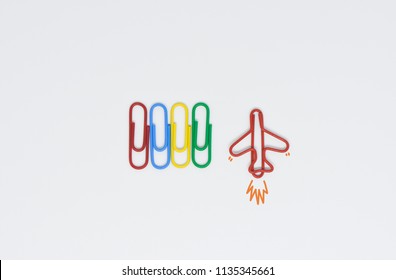 Business concept of difference employee for group of colorful paperclip and another difference red plane paperclip