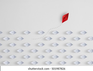  Business concept  as a group of paper ship in one direction and with one individual pointing in the different way as a business icon for innovative solution,minimal - Shutterstock ID 501987826
