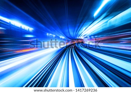 Business concept - high speed abstract track of motion light for background in tokyo, japan