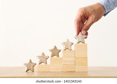 business concept image of setting a five star goal. increase rating or ranking, evaluation and classification idea - Shutterstock ID 1451343143