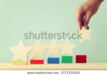 business concept image of setting a five star goal. increase rating or ranking, evaluation and classification idea