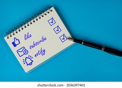 Business concept. Layout of pen and spiral notebook with text.Common actions for social media