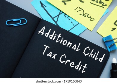 Business Concept Meaning Additional Child Tax Credit With Inscription On The Piece Of Paper.