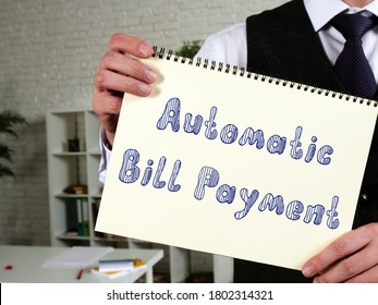 Business Concept Meaning Automatic Bill Payment With Sign On The Piece Of Paper.