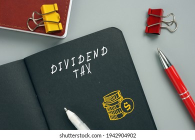 Business Concept Meaning DIVIDEND TAX With Inscription On The Page. AÂ dividend TaxÂ is AÂ taxÂ imposed By A Jurisdiction OnÂ dividendsÂ paid By A Corporation To Its Shareholders.
