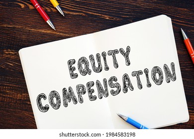 Business Concept Meaning Equity Compensation With Sign On The Piece Of Paper. 
