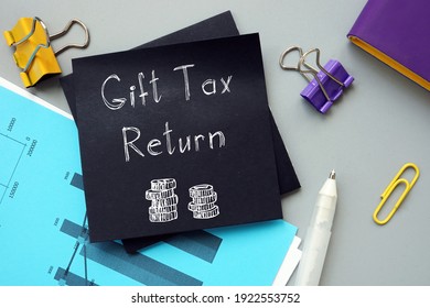 Business Concept Meaning Gift Tax Return With Sign On The Piece Of Paper.
