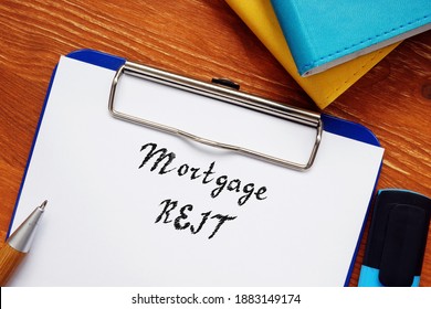 Business Concept Meaning Mortgage REIT With Phrase On The Page.
