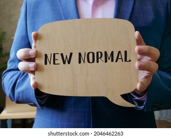 Business Concept Meaning NEW NORMAL With Phrase On The Page. 
