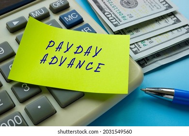 Business concept meaning PAYDAY ADVANCE with inscription on the sheet. 