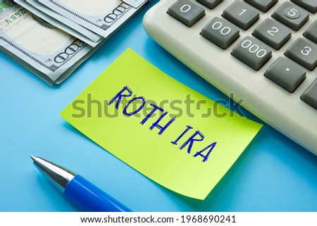 Business concept meaning ROTH IRA individual retirement account  with phrase on the page. 
