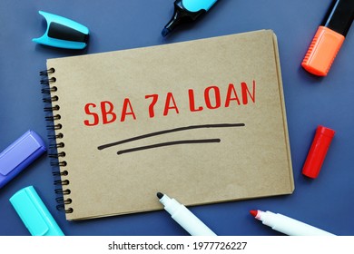 Business Concept Meaning SBA 7A LOAN Small Business Administration With Sign On The Piece Of Paper. 
