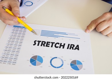 Business Concept Meaning STRETCH IRA With Phrase On The Printout With Diagrams And Tables. 
