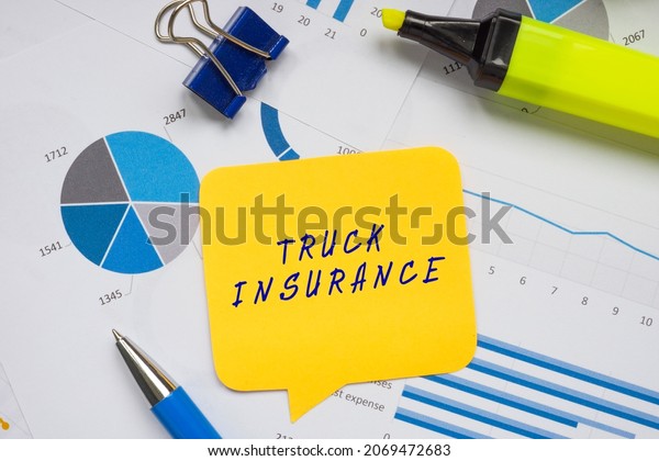 Business concept meaning TRUCK INSURANCE with phrase\
on the sheet. \
