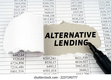 Business concept. In the middle of the document with financial statements, there is a hole with the inscription - ALTERNATIVE LENDING - Shutterstock ID 2237190777