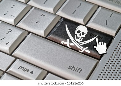 Business concept mouse cursor pressing pirate enter key on metallic keyboard