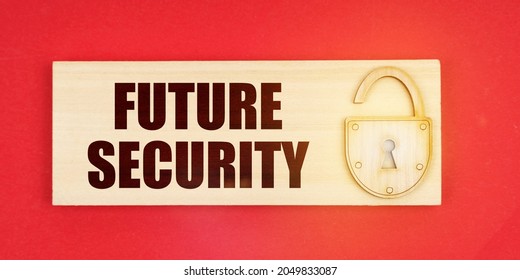 Business Concept. On A Red Background There Is A Small Plaque On It With A Lock And An Inscription - Future Security