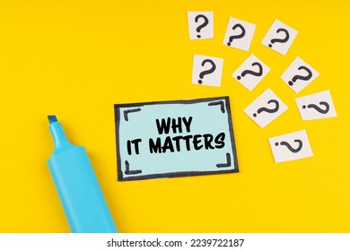 Business concept. On the yellow surface lies a blue marker, question marks and a sticker with the inscription - Why It Matters - Shutterstock ID 2239722187