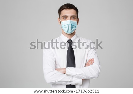 Business Concept - Portrait Handsome Businessman in face mask holding hands with confident face. White Background.