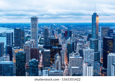 Business Concept For Real Estate And Corporate Construction - Panoramic Urban City Skyline Aerial View Under Bright Sky And Beautiful Sunset In Chicago, America