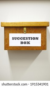 Business Concept Shot Of Wooden Suggestion Box On Wall In Office - Shutterstock ID 1915341901