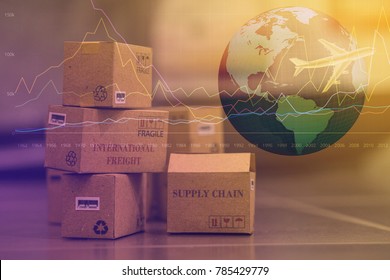 business concept: Small cardboard boxes with a plane flies above world map. Concept of  transportation, international freight, global shipping, goods or services remotely.  overseas trade, regional 