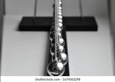 Business Concept For Strategy Team Work And Alignment. Newtons Cradle Pendulum.