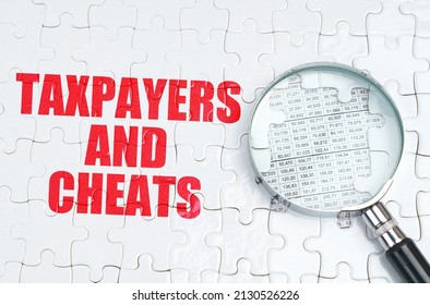 Business concept. There is a magnifying glass on the puzzles, next to it is written - Taxpayers and cheats - Shutterstock ID 2130526226