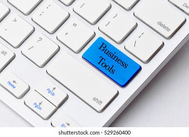 Business Concept: Business Tools On Computer Keyboard Background