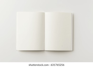 Business Concept - Top View Of Blank Notebook On White Background Desk For Mockup