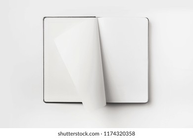 Business Concept - Top View Collection Of Black Hardcover Notebook, White Open & Flip Curl Rolled Page Isolated On Background For Mockup