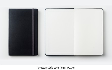 Business concept - Top view collection of black notebook on white background desk for mockup - Shutterstock ID 658400176
