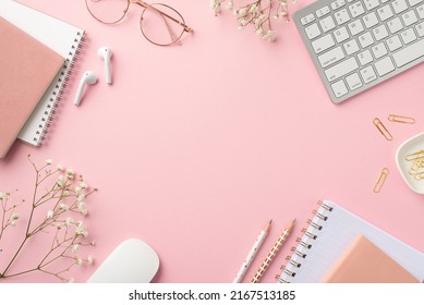 Business concept. Top view photo of workplace keyboard computer mouse reminders clips pencils glasses earbuds white gypsophila flowers on isolated pastel pink background with copyspace in the middle - Powered by Shutterstock