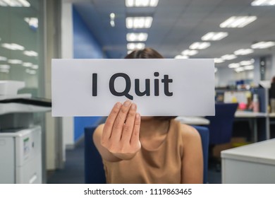 Business Concept - Woman Hold Paper Of I Quit In Office