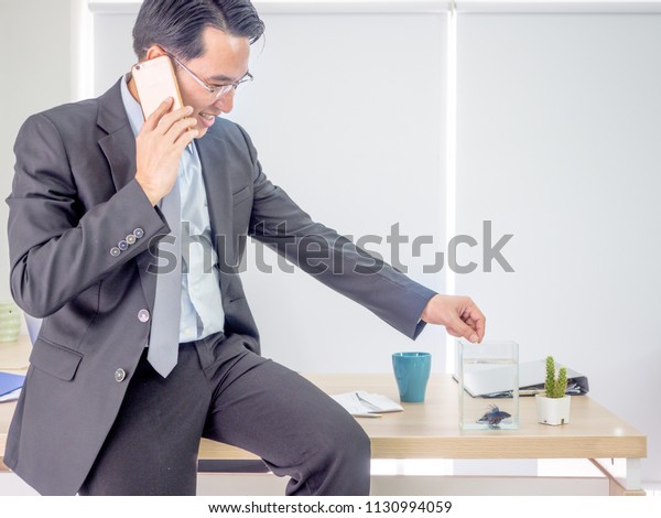 Business Conceptbusinessman Working Office Holding Smartphone