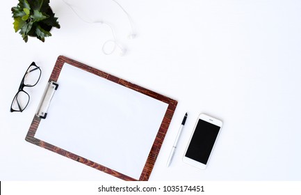 business Concept,Working with Clipboard Pen on table background,Top view,flat lay copy space - Shutterstock ID 1035174451