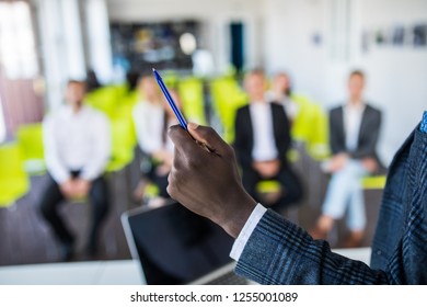Business conference. Business meeting. Business people in formalwear discussing something while sitting together at the table - Shutterstock ID 1255001089