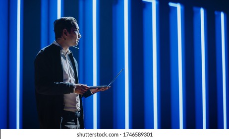 Business Conference Stage: Indian Tech Guru, Startup CEO Presents New Product, Holding Laptop, Does Motivational Talk, And Lecture About Science, Technology, Entrepreneurship, Development, Leadership