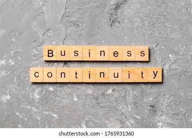 Business Continuity Word Written On Wood Block. Business Continuity Text On Cement Table For Your Desing, Concept.