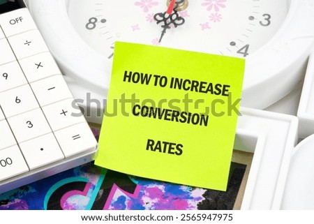 Business conversion rate optimization concept. Copy space. HOW TO INCREASE CONVERSION RATES written on a light green sticker.