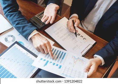 Business Corporate Team Brainstorming, Planning Strategy Having A Discussion Analysis Investment Researching With Chart At Office His Desk Documents And Saving Concept.