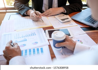 Business Corporate Team Brainstorming, Planning Strategy Having A Discussion Analysis Investment Researching With Chart At Office His Desk Documents And Saving Concept.