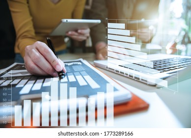 Business Corporate team brainstorming, Planning Strategy having a discussion Analysis investment researching with chart at office desk documents in office. - Shutterstock ID 1773289166