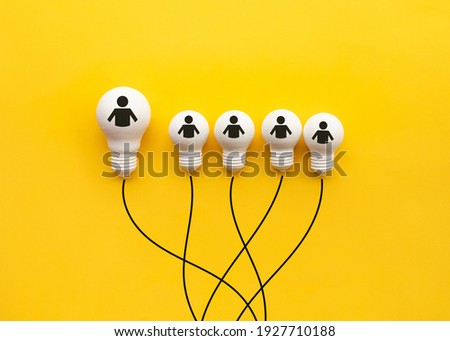 Business creativity and leadership concepts with lightbulb on yellow background.motivation for success.think big ideas