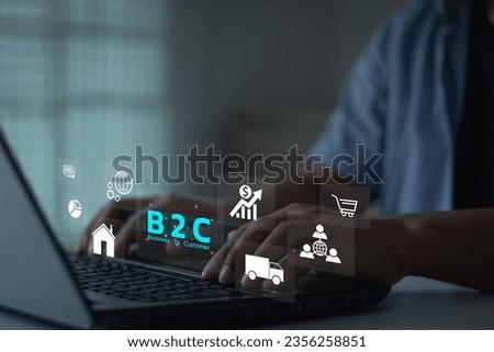 Business to customer ( B2C ) marketing strategy. Businessman working on laptop computers with B2C icons. Direct marketing between businesses that sell products or services and general consumers.