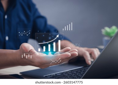 Business data analysis concept with statistical graphs, workflow on dashboard, business performance evaluation and measurement. Man's hand at data analysis graph working on computer on virtual screen.