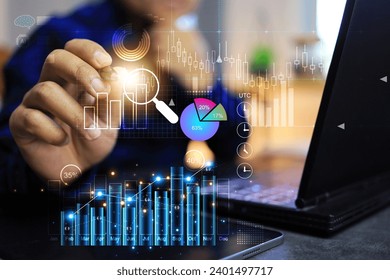 Business data analysis market research concept with businessman writing on graph and bar chart to analyze economic information in candle bar around the world on utc coordinate time analytic dashboard